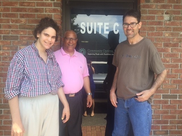 Community Options, Inc. of Summerville, SC was established to provide community-based options for residential and employment support services to individuals with disabilities living in the area. The photo includes Ms. Gabriel P., Mr. Marty P. & Alan Rose Executive Director.