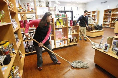 POM Susan Clavadetscher and Dan Reddington sweeping