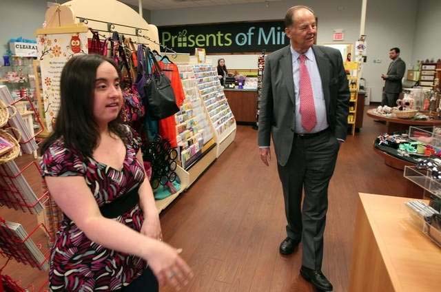 Susan Clavadetscher of Chester, left, gives New Jersey's 48th Governor, Thomas Kean, a tour during his visit to the Presents of Mind gift shop in Flanders. / Bob Karp/staff  Photographer