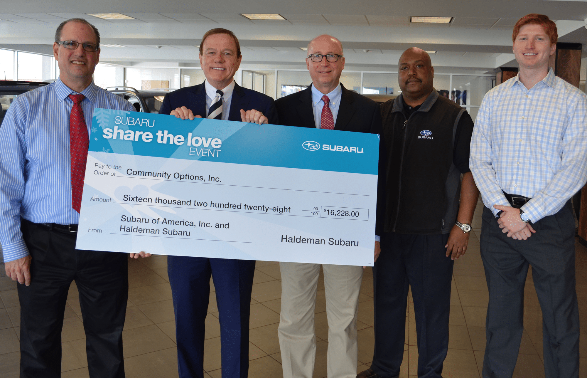 From L to R:  Haldeman Subaru Sales Manager, Jon Gross; Community Options President & CEO, Robert Stack; Haldeman Subaru General Manager, Greg Hritz; Subaru of America District Sales Manager, Fred Rice; Ryan Johnson, Subaru of America Management Associate