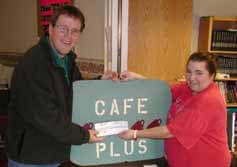 Luke Tynan of Syracuse won $1,000 in the 3rd Annual Community Options of Central New York Sweepstakes held in October. The sweepstakes was sponsored by local businesses, with a chinese auction and live music. Luke was presented the prize by Michelle DeLong, Community Support Staff