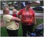 Jenny Windel, a person we provide support to in New mexico holds Sally Quinones baby Benny.