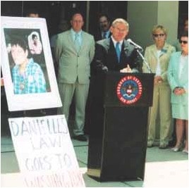 Robert Menendez during Rush Holts press conference speaking about Danielle’s Law. Danielle’s Law is in memory of a young woman from New Jersey, Danielle Gruskowski, whose life was cut tragically short by a failure to call 9-1-1. Photo taken June 20, 2005 | Courtesy of Robin Turner, Danielle’s Aunt