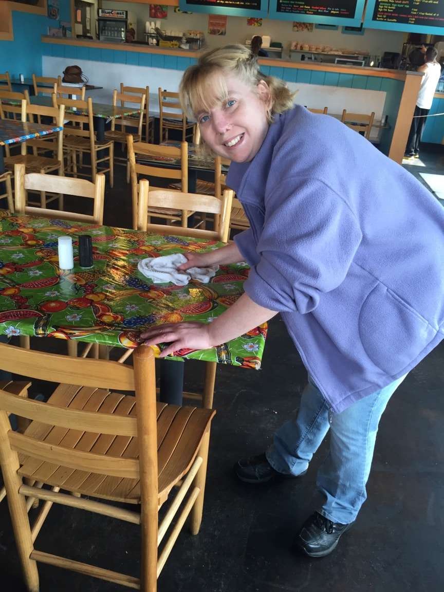 Amanda Cleaning The Table