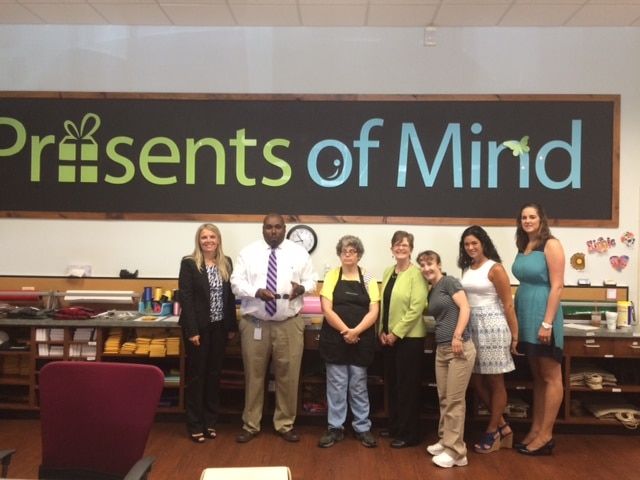 State of New Jersey’s Director of Vocational Rehabilitation Services Alice Hunnicutt visits Community Options' Presents of Mind in Flanders, NJ.