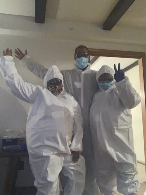 Nysheema Epps, Bryant DeShields, and Jerome White from Burlington, NJ donning their own personal protective equipment.