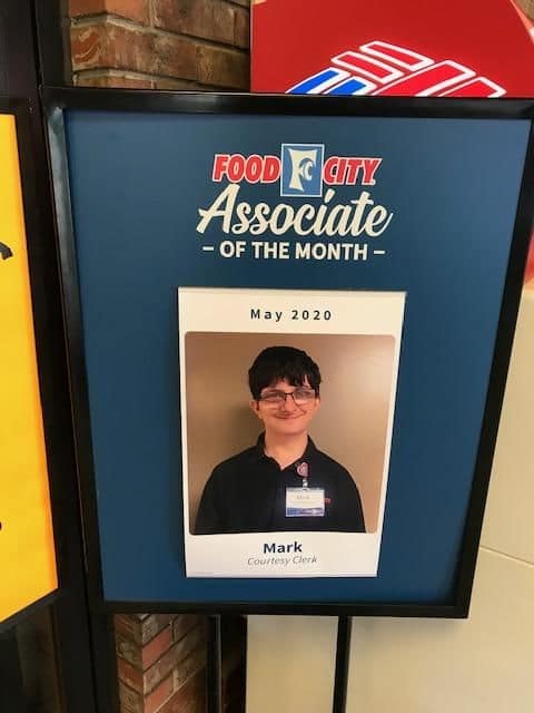 The food city employee of the month sign showing Johnson