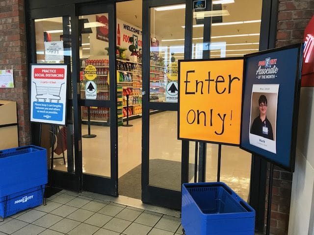 The food city employee of the month sign outside of the store