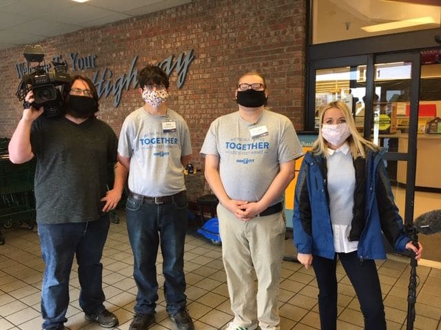 The food city doors with Walker and Johnson and two News Channel 9 employees