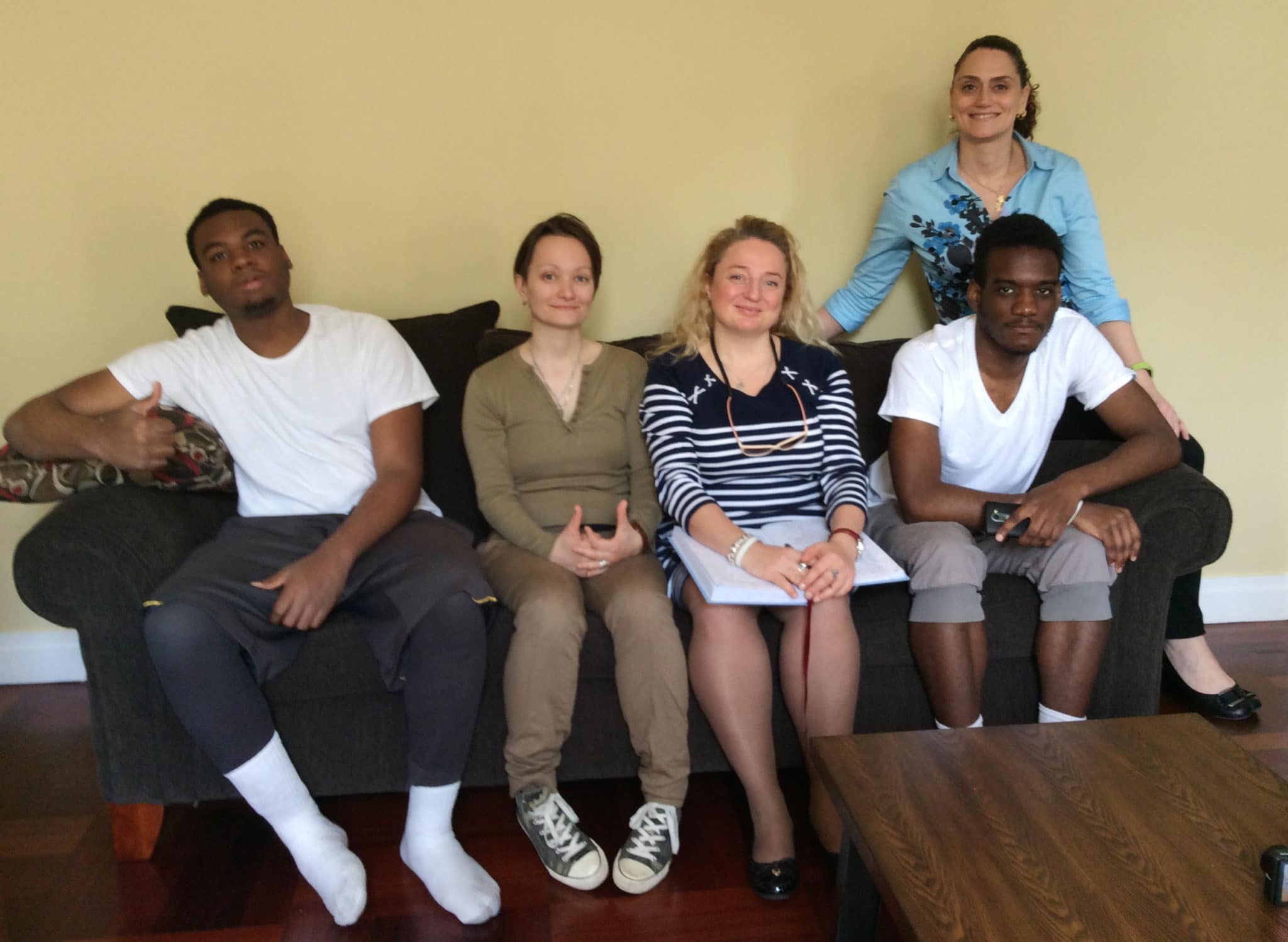 Caption from L to R:  Resident Anthony R.; Maria Khadeeva, Founder of Livefund; Elena Beregovaya, Director of The Vladimir Smirnov Foundation; Resident John H.; Angela Carotenuto-Rosen, New York City Executive Director for Community Options.