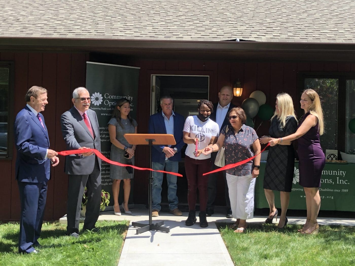 Everyone is on board to cut the ribbon on a new life.