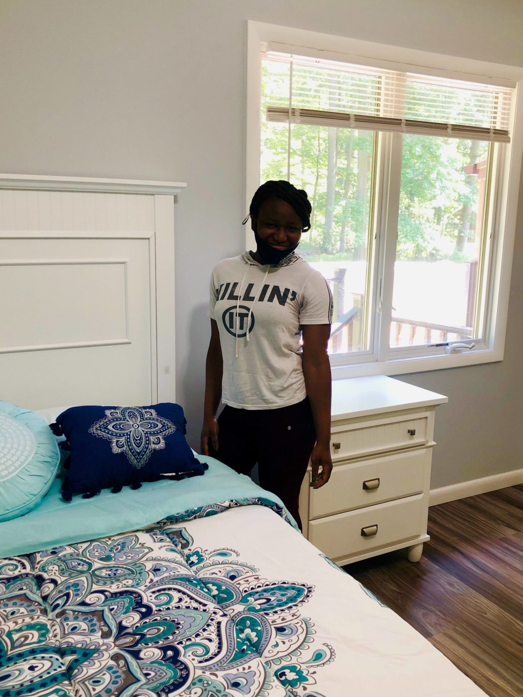 Veronica is proud to show off her new room.