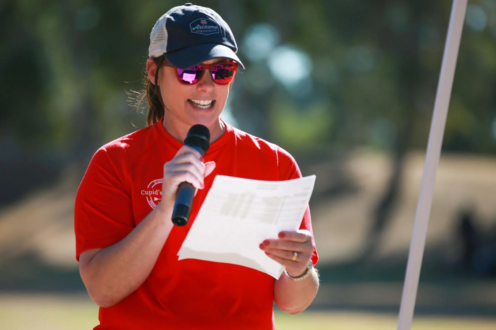 Executive director of Community Options, Inc., Kathryn Valles-Wallace announces age group winners after the Cupid's Chase 5K Run on February 12, 2022 at Reid Park. Ana Beltran, Arizona Daily Star - tucson.com