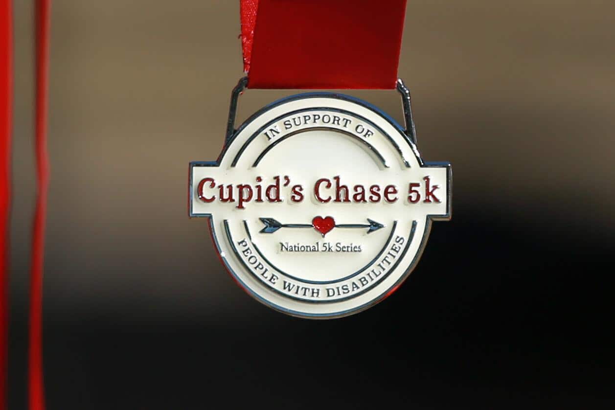Participation medal for the Cupid's Chase 5K Run on February 12, 2022 at Reid Park. Ana Beltran, Arizona Daily Star - tucson.com