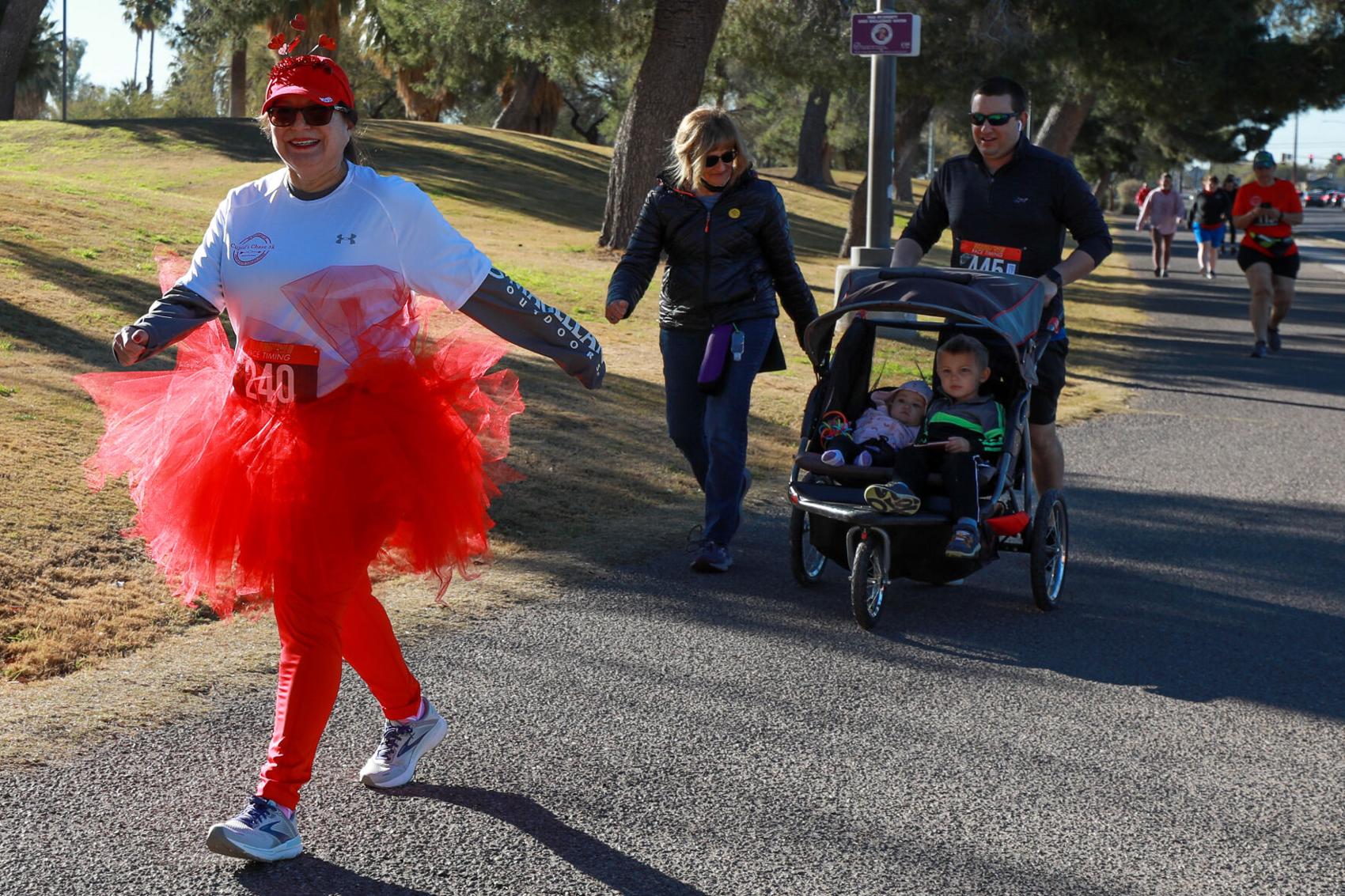 Maria Pasamante, runner 240, wears Valentine's themed clothing as she starts the Cupid's Chase 5K Run on February 12, 2022 at Reid Park. The Cupid's Chase 5K Run is a part of the national 5k series in support of people with disabilities. Ana Beltran, Arizona Daily Star - tucson.com
