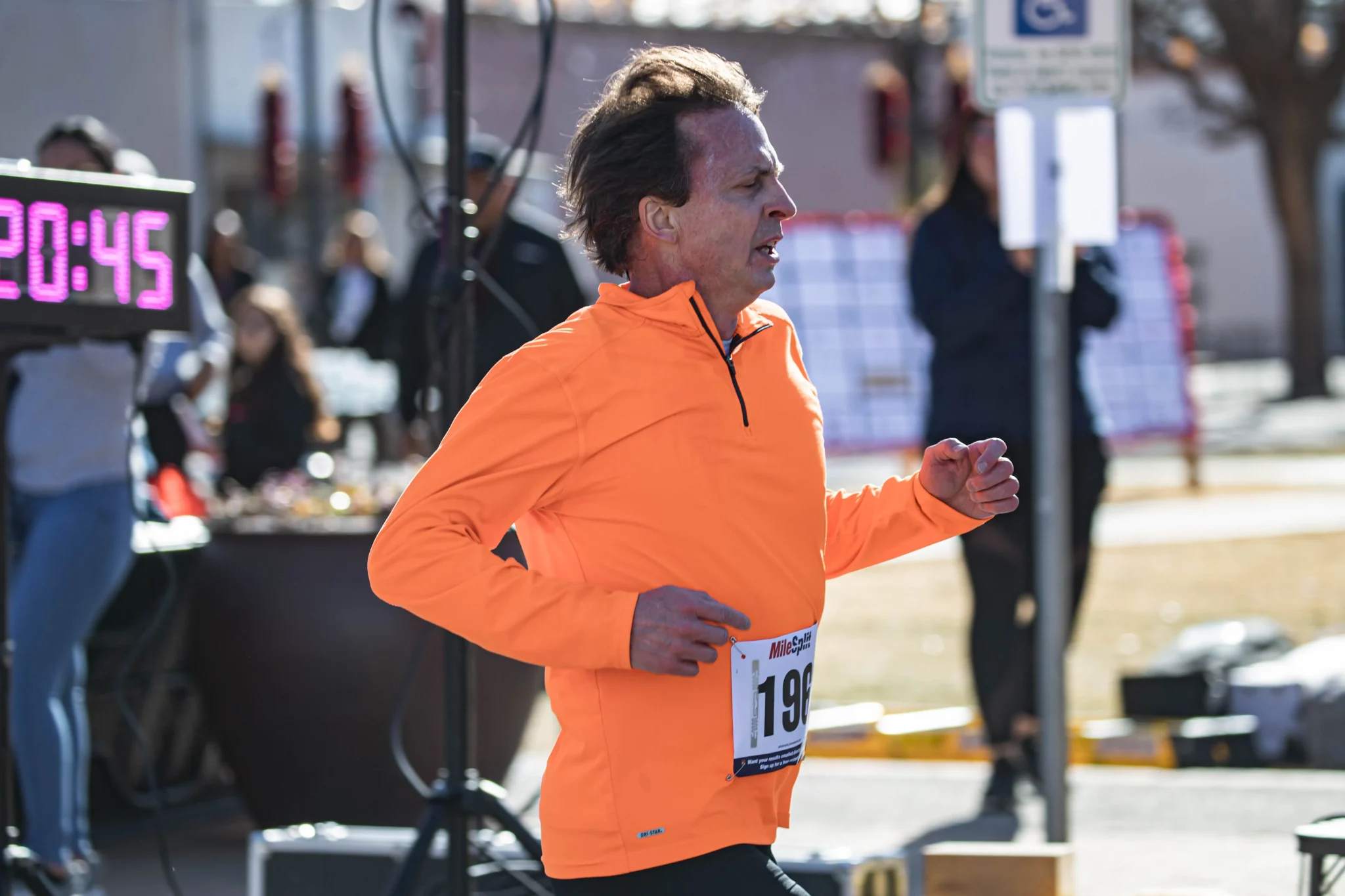 Runners finish at the Cupid's Chase 5K in Mesilla on Saturday, Feb. 12, 2022. Nathan J Fish/Sun-News - lcsun-news.com