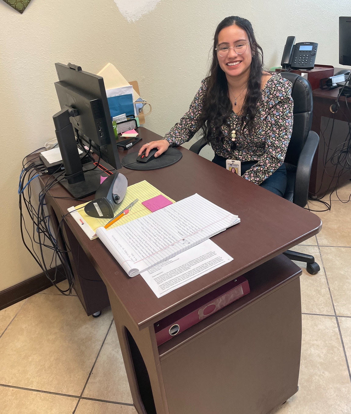 Isabela Valera at her job as Refugee Case Manager at Estrella Del Paso