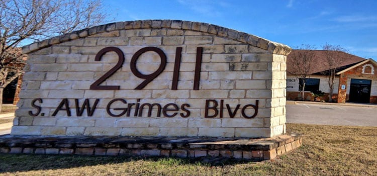 Austin Office exterior photo of sign at 2911 AW Grimes Boulevard, Building 5, Suite 510, Pflugerville, TX 78660
