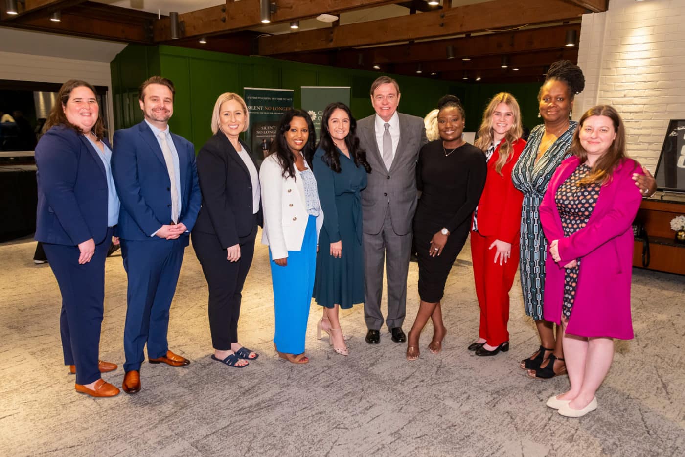 Lindsey Daniel, South Carolina State Director; Michael Burnett, Regional Vice President for Arizona and Utah; Noemi Rivera, New Mexico State Director; Tigest Alemu, Maryland State Director; Samantha Cutler, Regional Vice President for Texas and New Mexico; Robert P. Stack, Founder, President and Chief Executive Officer of Community Options; Fatimat Adekoya, New York State Director; Ashlyn Visser, Utah State Director; Meika McClendon, Tennessee State Director; and Lacie Parker, Vice President, Pennsylvania, are pictured on May 19, 2025, at Union League Liberty Hill in Lafayette Hill, PA, during the annual Phil Lian and Joan Mueller Phenomenal Golf Classic. A $200,000 matching gift from Lian and Mueller helped raise $500,000 to support people with disabilities.