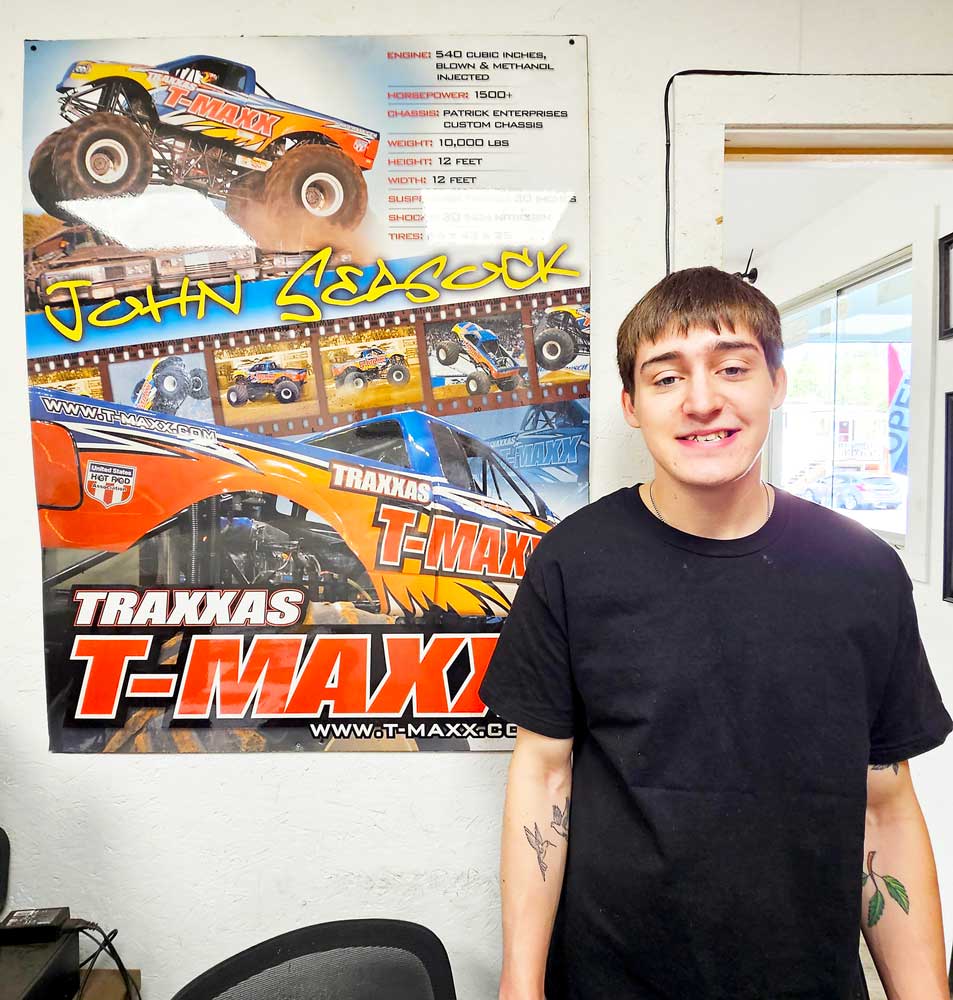 Adam at Black Rock Auto, after learning new automotive repair skills with John Seasock.