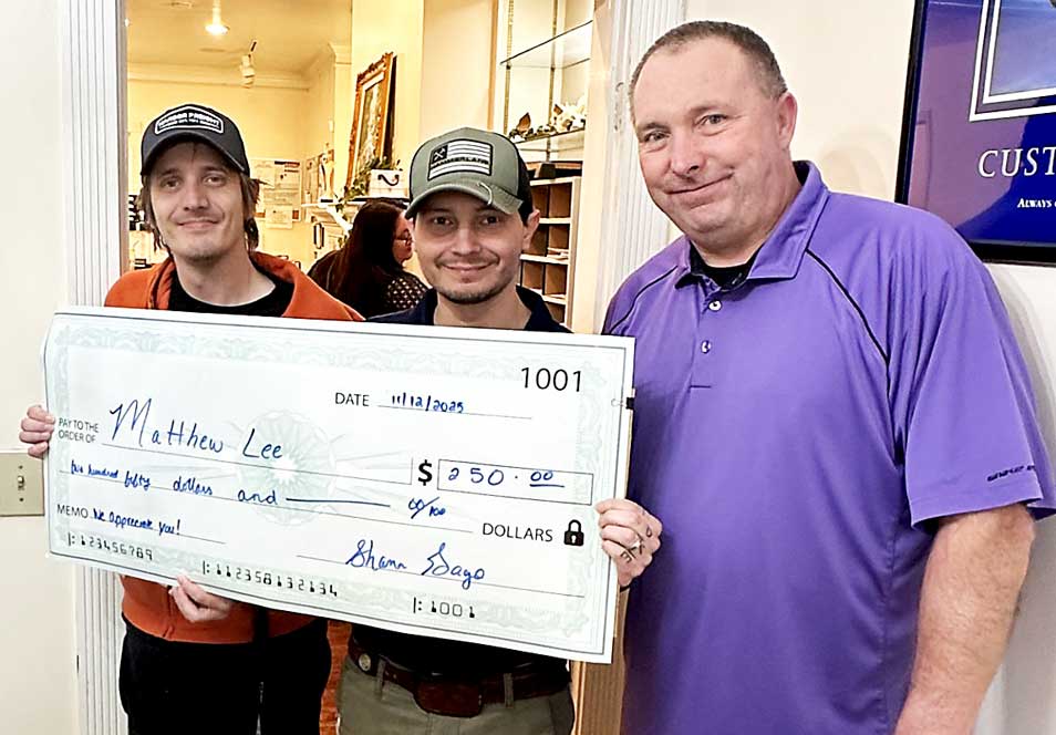 Matt Lee, left, received the Intrepid Award for his outstanding service and commitment from Program Manager Marcos Moen, center, and Interim Director of Residential Services Mike West, right.