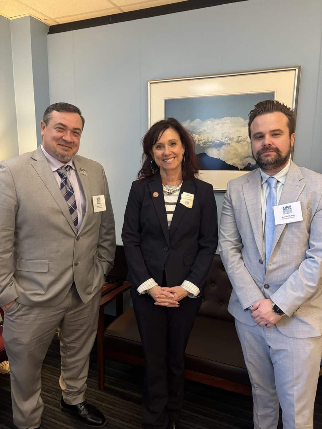 Michael Burnett and Shaun Crouse of Community Options with Arizona State Representative Nancy Gutierrez in her office at the Arizona State Capitol.