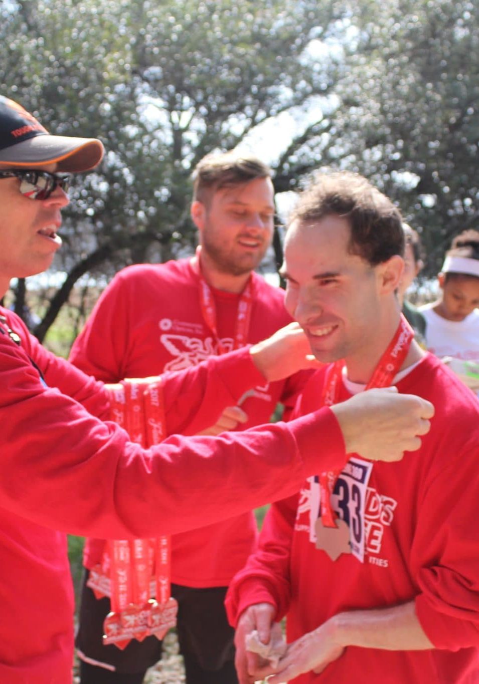Cupid's Chase race participant receiving a medal